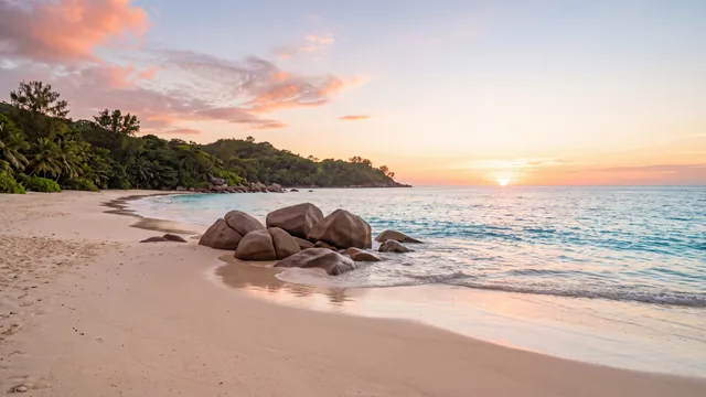 AI-created interpretation of Anse Lazio on Praslin at sunset, with pale sand, rounded granite boulders and clear Indian Ocean water beneath a coral sky.